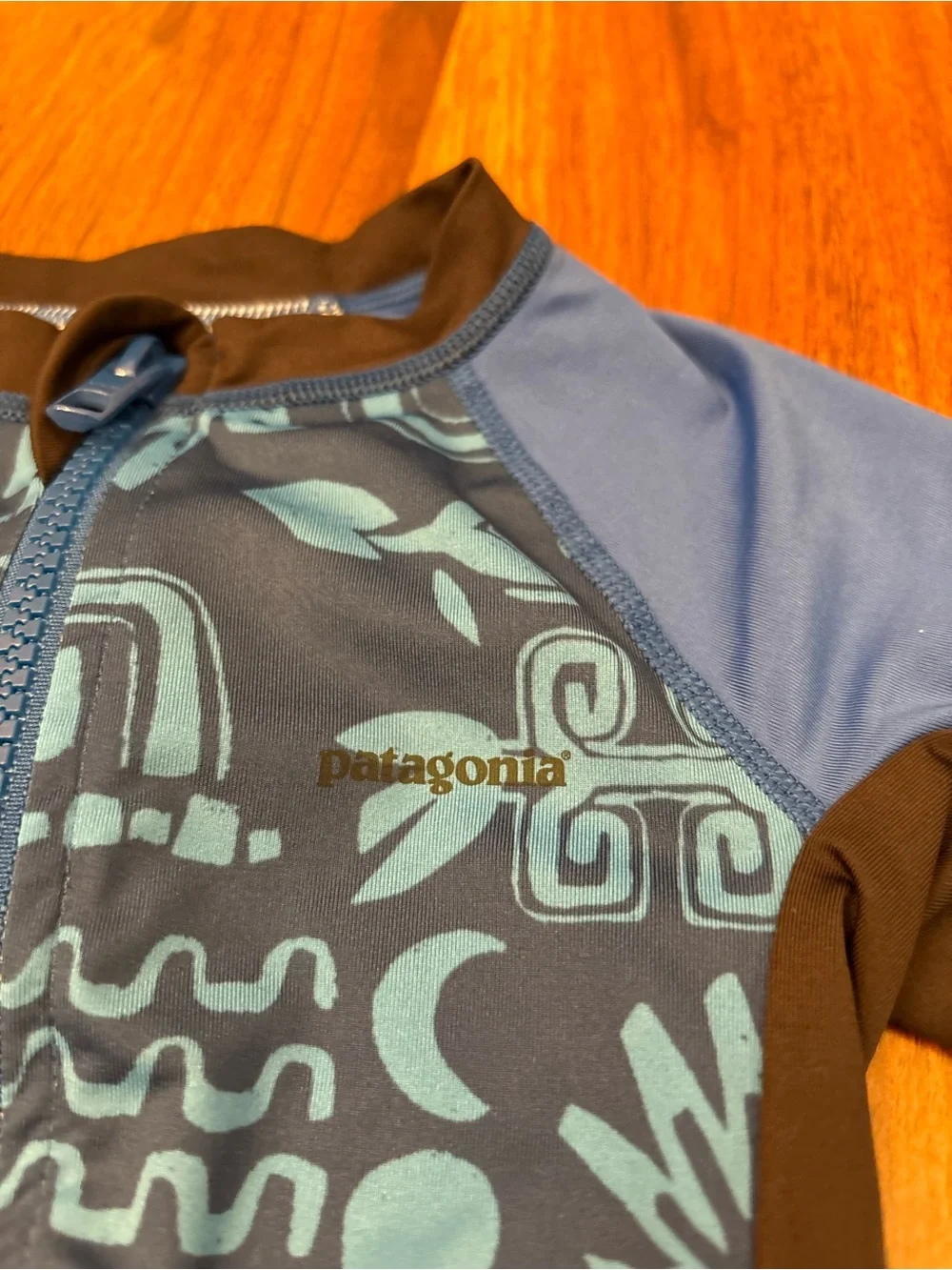 Patagonia blue/black long sleeve rashguard bathing suit with front zipper
